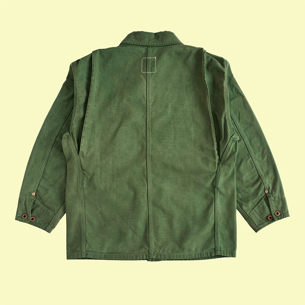 A green canvas farmers utility jacket shown from the back.